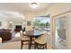Sunlit breakfast nook with large bay window overlooking the pool and backyard area at 3309 45Th E Ave, Bradenton, FL 34203