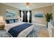 Bedroom is staged and has a beachy theme at 3600 Wisteria Pl, Punta Gorda, FL 33950
