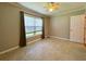 Bright bedroom with window, ceiling fan, and neutral flooring, offering comfortable living space at 3600 Wisteria Pl, Punta Gorda, FL 33950