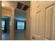 Hallway connecting to another room at 3600 Wisteria Pl, Punta Gorda, FL 33950