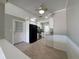 Bright kitchen features white cabinets, stainless steel appliances, and tile flooring at 3600 Wisteria Pl, Punta Gorda, FL 33950