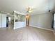 Spacious living area with tile flooring, plenty of natural light, and an open layout at 3600 Wisteria Pl, Punta Gorda, FL 33950