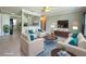 A beautifully staged living room with stylish furniture, neutral tones, and lots of natural light at 3600 Wisteria Pl, Punta Gorda, FL 33950