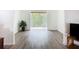 Bright balcony with tiled floor overlooking lush greenery at 3702 Lake Bayshore K-412 Dr # 412, Bradenton, FL 34205