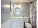 Updated bathroom with a marble vanity top, stylish fixtures and a shower with curtain at 3702 Lake Bayshore K-412 Dr # 412, Bradenton, FL 34205