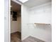 Walk-in closet with wood-look floors and wire shelving for storage at 3702 Lake Bayshore K-412 Dr # 412, Bradenton, FL 34205