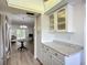 Bright kitchen featuring white cabinetry, modern countertop and stainless steel appliances at 3702 Lake Bayshore K-412 Dr # 412, Bradenton, FL 34205