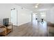 Spacious living room featuring wood-look flooring and natural light at 3702 Lake Bayshore K-412 Dr # 412, Bradenton, FL 34205