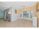 Bright dining room with a bay window and neutral tile flooring offers ample natural light at 3718 61St E Dr, Bradenton, FL 34203