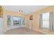 The dining room features a bright bay window, yellow walls, and tile flooring at 3718 61St E Dr, Bradenton, FL 34203