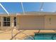 Features a pool area with a shutter and an extended concrete deck at 3718 61St E Dr, Bradenton, FL 34203