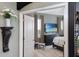 Cozy bedroom with a dresser, a tv, and decor at 3806 72Nd E Ter, Sarasota, FL 34243