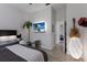 Well-lit bedroom featuring a workspace, plant accents, and a soothing ambiance, ideal for relaxation at 3806 72Nd E Ter, Sarasota, FL 34243