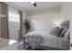 Cozy bedroom featuring a comfortable bed, soft lighting, and a serene atmosphere, perfect for relaxation at 3806 72Nd E Ter, Sarasota, FL 34243