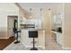 Functional kitchen area with a breakfast bar offering seamless flow to living and dining areas at 3919 Fan Palm Ct, Land O Lakes, FL 34638