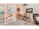 Cozy dining area with table, chairs, and decorative wall art at 4023 Chestnut Ave, Sarasota, FL 34234