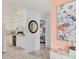 Bright kitchen with white cabinetry and modern appliances, seamlessly connected to the living area for convenient living at 4023 Chestnut Ave, Sarasota, FL 34234