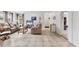 Spacious living room featuring tile floors, neutral walls, and a comfortable seating arrangement, offering a relaxing atmosphere at 4023 Chestnut Ave, Sarasota, FL 34234