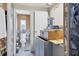 Renovations underway to create a modern bathroom with stylish wallpaper and updated sink with cabinets at 4119 13Th E St, Ellenton, FL 34222