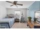 Comfortable bedroom with nautical accents, featuring a cozy bed, classic furniture, and soft natural light at 4119 13Th E St, Ellenton, FL 34222