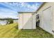 Exterior view of home featuring siding, a utility shed and a well-maintained lawn at 4119 13Th E St, Ellenton, FL 34222