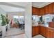Bright view from the kitchen leads to an office, highlighting the home's layout and design at 4119 13Th E St, Ellenton, FL 34222