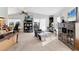 Bright living room with a ceiling fan, large TV, and comfortable seating area at 4119 13Th E St, Ellenton, FL 34222