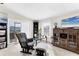 Inviting living room featuring a TV, sliding glass doors, and comfortable seating at 4119 13Th E St, Ellenton, FL 34222