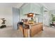 Cozy living room open to the kitchen, featuring a TV and casual decor at 4119 13Th E St, Ellenton, FL 34222
