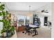 Bright office area with ample natural light, a ceiling fan, and sliding glass doors at 4119 13Th E St, Ellenton, FL 34222