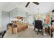 The office space blends seamlessly, featuring built-in storage, a ceiling fan, and light decor at 4119 13Th E St, Ellenton, FL 34222
