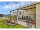 Inviting patio with a variety of potted plants and comfortable seating, ideal for outdoor enjoyment at 4119 13Th E St, Ellenton, FL 34222