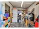 Organized storage shed with a stackable washer/dryer and ample space for tools and equipment at 4119 13Th E St, Ellenton, FL 34222