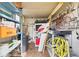 Storage room with shelving units filled with various household items and gardening supplies at 4119 13Th E St, Ellenton, FL 34222