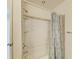 Shower with a white enclosure and leafy shower curtain at 4381 Sandner Dr, Sarasota, FL 34243