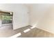 Bedroom featuring neutral carpet and a sliding glass door to the outside at 4381 Sandner Dr, Sarasota, FL 34243