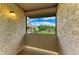 Screened-in patio with exterior lighting and a view of the lush green lawn at 4381 Sandner Dr, Sarasota, FL 34243