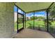 Screened-in patio with a view of the lush green lawn at 4381 Sandner Dr, Sarasota, FL 34243