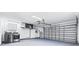 A spacious two-car garage with overhead storage, laundry area, and access door at 4425 Parnell Dr, Sarasota, FL 34232