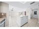 Open floor plan featuring a kitchen with island and seamless flow into the living area at 4425 Parnell Dr, Sarasota, FL 34232