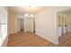 Spacious dining area featuring wood floors and modern light fixture at 4506 20Th W St, Bradenton, FL 34207