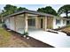 Attractive one-story home featuring a covered carport with decorative stone columns at 4506 20Th W St, Bradenton, FL 34207