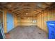 Interior view of a shed featuring wooden shelves and ample storage space at 4506 20Th W St, Bradenton, FL 34207