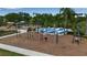Playground swings and splash pad providing entertainment for children at 5036 Brickell Park Cv, Bradenton, FL 34211