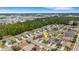 A captivating aerial view reveals a well-planned neighborhood with lush greenery and charming single-Gathering homes at 5111 11Th E St, Bradenton, FL 34203