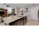 Open kitchen featuring an island with granite countertop with pendant lighting above at 5111 11Th E St, Bradenton, FL 34203