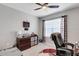 Functional home office featuring a work station, natural light, and comfortable office chair at 5111 11Th E St, Bradenton, FL 34203