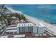 Aerial view of beachfront condos with pristine beach access, parking and easy access to the Intracoastal at 5200 Gulf Dr # 408, Holmes Beach, FL 34217