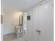A traditional bathroom featuring a vanity with a framed mirror and an enclosed shower at 5200 Gulf Dr # 408, Holmes Beach, FL 34217