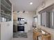 Bright and spacious kitchen with stainless steel appliances and custom cabinetry at 5200 Gulf Dr # 408, Holmes Beach, FL 34217